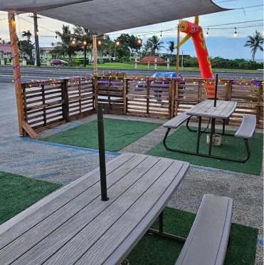 Shaded picnic tables on the taproom patio (Instagram, opens in a new tab)